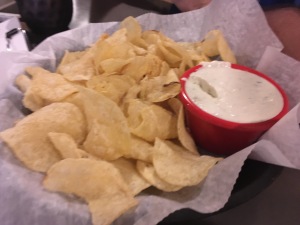 No, it didn't come served with a chip imprint in the middle of the dip. Thanks, Shane. 